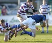 12 February 2007; Conor McGlade, St. Mary's College, is tackled by Shane Kennedy and Tom Fletcher, Clongowes Wood College. Leinster Schools Cup Quarter-Final, Clongowes Wood College v St Mary's College, Donnybrook, Dublin. Picture credit: David Maher / SPORTSFILE