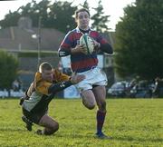 17 February 2007; Niall McNamara, Clontarf, is tackled by Adrian Hanley, Buccaneers, on his way to scoring his side's second try. AIB League, Division 1, Clontarf v Buccaneers, Castle Avenue, Clontarf, Dublin. Picture credit: Pat Murphy / SPORTSFILE