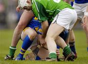 18 February 2007; Paul Kelly, Tipperary, under pressure from Limerick defenders William Walsh and Brian Greary. Allianz National Hurling League, Division 1B, Round 1, Tipperary v Limerick, McDonagh Park, Nenagh, Co. Tipperary. Picture credit: Ray McManus / SPORTSFILE