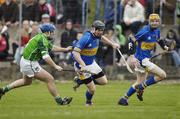 18 February 2007; Danny O'Halloran, Tipperary, in action against Damien Reale, Limerick. Allianz National Hurling League, Division 1B, Round 1, Tipperary v Limerick, McDonagh Park, Nenagh, Co. Tipperary. Picture credit: Ray McManus / SPORTSFILE