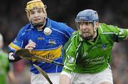 18 February 2007; Damien Reale, Limerick, in action against Lar Corbett, Tipperary. Allianz National Hurling League, Division 1B, Round 1, Tipperary v Limerick, McDonagh Park, Nenagh, Co. Tipperary. Picture credit: Ray McManus / SPORTSFILE