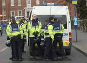 24 February 2007; Members of An Garda Síochána in riot gear arrive outside Croke Park before the Six Nations game against England. Croke Park, Dublin. Picture Credit: Brian Lawless / SPORTSFILE *** Local Caption ***