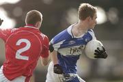 25 February 2007; Ross Munnelly, Laois, in action against David Brennan, Louth. Allianz National Football League, Division 1B, Round 3, Laois v Louth, O'Moore Park, Portlaoise, Co. Laois. Photo by Sportsfile *** Local Caption ***