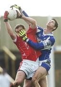 25 February 2007; Paddy Keenan, Louth, wins possession against Brendan Quigley, Laois. Allianz National Football League, Division 1B, Round 3, Laois v Louth, O'Moore Park, Portlaoise, Co. Laois. Photo by Sportsfile