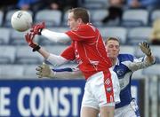 25 February 2007; Christy Grimes, Louth, in action against Peter O'Leary, Laois. Allianz National Football League, Division 1B, Round 3, Laois v Louth, O'Moore Park, Portlaoise, Co. Laois. Photo by Sportsfile