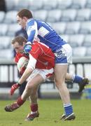 25 February 2007; Christy Grimes, Louth, in action against Brian McCormack, Laois. Allianz National Football League, Division 1B, Round 3, Laois v Louth, O'Moore Park, Portlaoise, Co. Laois. Photo by Sportsfile