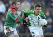 25 February 2007; Andrew Lane, Limerick, in action against Trevor Mortimer, Mayo. Allianz National Football League, Division 1A, Round 3, Mayo v Limerick, McHale Park, Castlebar, Mayo. Picture Credit: Matt Browne / SPORTSFILE