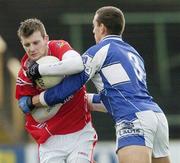 25 February 2007; Mark Brennan, Louth, in action against Darren Rooney, Laois. Allianz National Football League, Division 1B, Round 3, Laois v Louth, O'Moore Park, Portlaoise, Co. Laois. Photo by Sportsfile