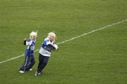25 February 2007; Two young Laois supporters play about on the pitch before the start of the game. Allianz National Football League, Division 1B, Round 3, Laois v Louth, O'Moore Park, Portlaoise, Co. Laois. Photo by Sportsfile *** Local Caption ***