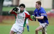 2 March 2007; Liam Hinphey, UUC, in action against Paul Devine, LJM. Ulster Bank Trench Cup Semi-Final, Liverpool John Moores University v University of Ulster Coleraine, Queen's University, Belfast, Co. Antrim. Picture credit: Oliver McVeigh / SPORTSFILE