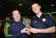 5 March 2007; The Republic of Ireland Under 18 team captain Michael Spillane with manager Sean McCaffrey at Dublin Airport after winning the Four Nations Tournament in Lisbon. Dublin Airport, Dublin. Picture credit: David Maher / SPORTSFILE