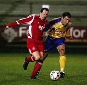 5 March 2007; Richard Clarke, Portadown, in action against Ryan McCluskey, Dungannon Swifts. Setanta Cup Group 2, Portadown v Dungannon Swifts, Shamrock Park, Portadown, Co. Armagh. Picture credit: Oliver McVeigh / SPORTSFILE