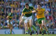 21 September 2014; David Moran, Kerry, in action against Leo McLoone, Donegal. GAA Football All Ireland Senior Championship Final, Kerry v Donegal. Croke Park, Dublin. Picture credit: Brendan Moran / SPORTSFILE