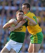 21 September 2014; David Moran, Kerry, in action against Leo McLoone, Donegal. GAA Football All Ireland Senior Championship Final, Kerry v Donegal. Croke Park, Dublin. Picture credit: Brendan Moran / SPORTSFILE