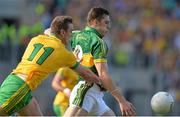 21 September 2014; David Moran, Kerry, in action against Leo McLoone, Donegal. GAA Football All Ireland Senior Championship Final, Kerry v Donegal. Croke Park, Dublin. Picture credit: Brendan Moran / SPORTSFILE