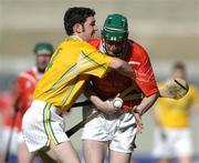 17 March 2004; James Bowles, Newtownshandrum, is tackled by Frankie McMullan, Dunloy. AIB All-Ireland Club Hurling Final, Newtownshandrum v Dunloy, Croke Park, Dublin, Photo by Brendan Moran/Sportsfile