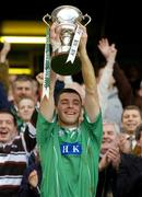 17 March 2004; Caltra captain Noel Meehan lifts the Tommy Moore cup following the AIB All-Ireland Senior Club Football Championship Final between An Gaeltacht and Caltra at Croke Park in Dublin. Photo by Brendan Moran/Sportsfile