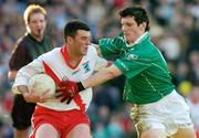 17 March 2004; Roibeard Mac Gearailt of An Ghaeltacht in action against Michael Meehan of Caltra during the AIB All-Ireland Senior Club Football Championship Final between An Gaeltacht and Caltra at Croke Park in Dublin. Photo by Brian Lawless/Sportsfile
