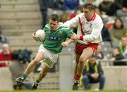 17 March 2004; Declan Meehan of Caltra in action against Darragh O'Se of An Gaeltacht during the AIB All-Ireland Senior Club Football Championship Final between An Gaeltacht and Caltra at Croke Park in Dublin. Photo by Brendan Moran/Sportsfile