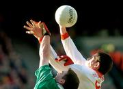 17 March 2004; Pol O Cuinn of An Gaeltacht in action against Damien Cunniffe of Caltra during the AIB All-Ireland Senior Club Football Championship Final between An Gaeltacht and Caltra at Croke Park in Dublin. Photo by Brian Lawless/Sportsfile