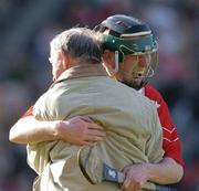 17 March 2004; Newtownshandrum sub John O'Connor celebrates with fellow club member Chris Morrisey after the game. AIB All-Ireland Club Hurling Final, Newtownshandrum v Dunloy, Croke Park, Dublin, Picture credit; Ray McManus / SPORTSFILE *EDI*