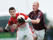 11 March 2007; Mark Brennan, Louth, in action against Donal O'Donoghue, Westmeath. Allianz National Football League, Division 1B Round 4, Louth v Westmeath, St. Brigid's Park, Dowdallshill Dundalk, Co. Louth. Photo by Sportsfile