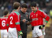 11 March 2007; The Mayo manager John O'Mahoney with defenders Liam O'Malley, left, and James Kilcullen before the start of the game. Allianz National Football League, Division 1A Round 4, Fermanagh v Mayo, St Tighearnach's Park, Clones, Co. Monaghan. Picture credit: Ray McManus / SPORTSFILE