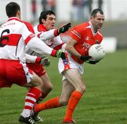 11 March 2007; Steven McDonnell, Armagh, in action against Kevin McGuckin, Derry. Allianz National Football League, Division 1B Round 4, Armagh v Derry, Oliver Plunkett Park, Crossmaglen, Co. Armagh. Picture credit: Oliver McVeigh / SPORTSFILE