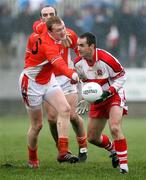 11 March 2007; Sean Martin Lockhart, Derry, in action against Paul Keenan, Armagh. Allianz National Football League, Division 1B Round 4, Armagh v Derry, Oliver Plunkett Park, Crossmaglen, Co. Armagh. Picture credit: Oliver McVeigh / SPORTSFILE