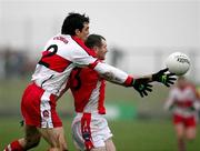11 March 2007; Kevin McGuckin, Derry, contsts a ball against Steven McDonnell, Armagh. Allianz National Football League, Division 1B Round 4, Armagh v Derry, Oliver Plunkett Park, Crossmaglen, Co. Armagh. Picture credit: Oliver McVeigh / SPORTSFILE