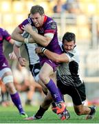 27 September 2014; Darren Cave, Ulster, is tackled by Guglielmo Palazzan, Zebre. Guinness PRO12, Round 4, Zebre v Ulster. Stadio XXV Aprile, Parma, Italy. Picture credit: Roberto Bregani / SPORTSFILE