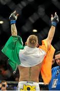 27 September 2014; Conor McGregor, celebrates after defeating Dustin Poirier, in the first round during their featherweight bout. UFC 178, Dustin Poirier v Conor McGregor, MGM Grand Garden Arena, Las Vegas, Nevada, USA. Picture credit: Stephen R. Sylvanie / SPORTSFILE