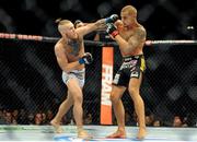 27 September 2014; Conor McGregor, in action against Dustin Poirier. UFC 178, Dustin Poirier v Conor McGregor, MGM Grand Garden Arena, Las Vegas, Nevada, USA. Picture credit: Stephen R. Sylvanie / SPORTSFILE