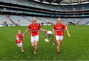 28 September 2014; Cork captain Briege Corkery, centre, with her sister Mairead, right, and their niece Bridgín, with the Brendan Martin Cup. TG4 All-Ireland Ladies Football Senior Championship Final, Cork v Dublin. Croke Park, Dublin. Picture credit: Brendan Moran / SPORTSFILE