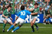 17 March 2007; Ronan O'Gara, Ireland, is tackled by Ramiro Pez, Italy. RBS Six Nations Rugby Championship, Ireland v Italy, Stadio Flaminio, Rome, Italy. Picture credit: Brendan Moran / SPORTSFILE