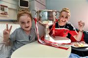29 September 2014; Cork captain Briege Corkery with eight year old Harry Cooke, from Glasnevin, Co. Dublin, and the Brendan Martin Cup during a visit to Temple Street Childrens Hospital, Dublin. Photo by Sportsfile