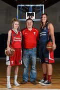 1 October 2014; Singleton Supervalu Brunell coach Kieran O'Leary with players Megan O'Leary, left, and Katie Hannemall during the launch of the Basketball Ireland 2014/2015 Season. As winter approaches, Ireland’s most popular indoor sport officially launched its new season today. Basketball clubs from around the country gathered at the National Basketball Arena in Tallaght for the launch of the national league season for 2014/2015. All the action gets underway this Saturday as 32 teams across 4 divisions fight it out to be the best basketballers in the country. Women’s Premier League and Cup Champions Team Montenotte get their account underway against Singleton Supervalu Brunell in a Cork derby while defending Men’s Champions Killester are away to DCU Saints. The draw for the National Cups also took place today. National Basketball Arena, Tallaght, Dublin. Picture credit: Brendan Moran / SPORTSFILE