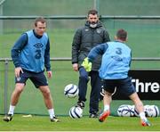 8 October 2014; Republic of Ireland assistant manager Roy Keane, watches on during squad training ahead of their UEFA EURO 2016 Championship Qualifer, Group D, game against Gibraltar on Saturday. Republic of Ireland Squad Training, Gannon Park, Malahide, Co. Dublin. Picture credit: David Maher / SPORTSFILE