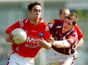 1 April 2007; John O'Brien, Louth, in action against Niall Coyne, Galway. Allianz National Football League, Division 1B Round 6, Louth v Galway, Dowdallshill, Dundalk, Co. Louth. Photo by Sportsfile