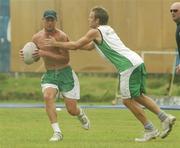 1 April 2007; Ireland's Paul Mooney is tackled by William Porterfield during team training. Everest Cricket Club, Georgetown, Guyana. Picture credit: Pat Murphy / SPORTSFILE