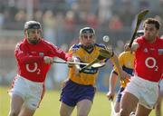 1 April 2007; Tyrone Kearse, Clare, in action against Shane O'Neill and Sean Og O hAilpin, Cork. Allianz National Hurling League, Division 1A Round 5, Clare v Cork, Cusack Park, Ennis, Co. Clare. Picture credit: Kieran Clancy / SPORTSFILE