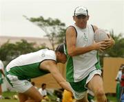 1 April 2007; Ireland's Trent Johnston goes past the challenge of Boyd Rankin during team training. Everest Cricket Club, Georgetown, Guyana. Picture credit: Pat Murphy / SPORTSFILE