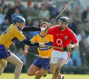 1 April 2007; Neil Ronan, Cork, in action against Frank Lohan and Brian O'Connell, Clare. Allianz National Hurling League, Division 1A Round 5, Clare v Cork, Cusack Park, Ennis, Co. Clare. Picture credit: Kieran Clancy / SPORTSFILE