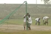 1 April 2007; Ground staff dismantel the nets during Ireland team training due to bad weather. Everest Cricket Club, Georgetown, Guyana. Picture credit: Pat Murphy / SPORTSFILE