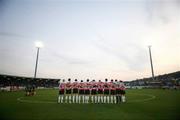 2 April 2007; The Derry City team stand for a minutes silence before the match. Setanta Cup Group 1, Derry City v Glentoran, Brandywell, Derry. Picture credit: Russell Pritchard / SPORTSFILE