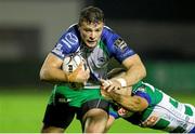 10 October 2014; Robbie Henshaw, Connaught, is tackled by Edoardo Gori, Benetton Treviso. Guinness PRO12, Round 6, Benetton Treviso v Connacht. Stadio Comunale di Monigo, Treviso, Italy. Picture credit: Roberto Bregani / SPORTSFILE