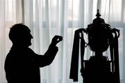 4 April 2007; FAI president David Blood holds a ball drawn during the FAI Ford Senior Cup Draw 2007. Clarion Hotel, The IFSC, Dublin. Picture credit: David Maher / SPORTSFILE