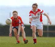 8 April 2007; Maebh Moriarty, Armagh, in action against Geraldine O'Flynn, Cork. Suzuki Laldies, NFL Quarter Final, Cork v Armagh, Park Rathineskea, Co. Laois. Photo by Sportsfile