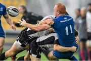 11 October 2014; Darragh Fanning, Leinster, off-loads from the tackle of Gonzalo Garcia, left, and Giulio Toniolatti, Zebre. Guinness PRO12, Round 6, Zebre v Leinster. Stadio XXV Aprile, Parma, Italy. Picture credit: Ramsey Cardy / SPORTSFILE