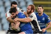 11 October 2014; Mick McGrath, Leinster, is tackled by Leonardo Sarto, left, and Gonzalo Garcia, Zebre. Guinness PRO12, Round 6, Zebre v Leinster. Stadio XXV Aprile, Parma, Italy. Picture credit: Ramsey Cardy / SPORTSFILE